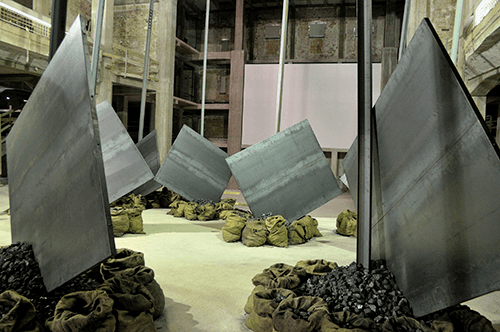 An installation created in the interior of Ruderi del Teatro Margherita in Bari, Italy (2010) that cultivated a dynamic relationship between Kounellis’s art and the body of the visitor as they moved through the space. Bari, Ruderi del Teatro Margherita, Mostra, Jannis Kounellis a Bari nella foto le installazioni della Mostra. Foto: Gaetano Lo Porto© 2021. AGF/Scala, Florence © Adagp, Paris, 2021 - Photo : Adagp images 