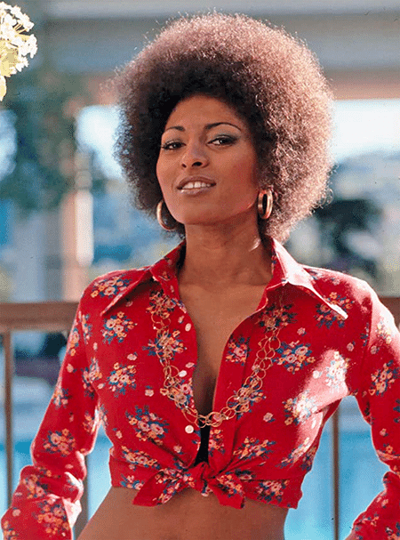 Pam Grier Quote: “Does a black person make them an African